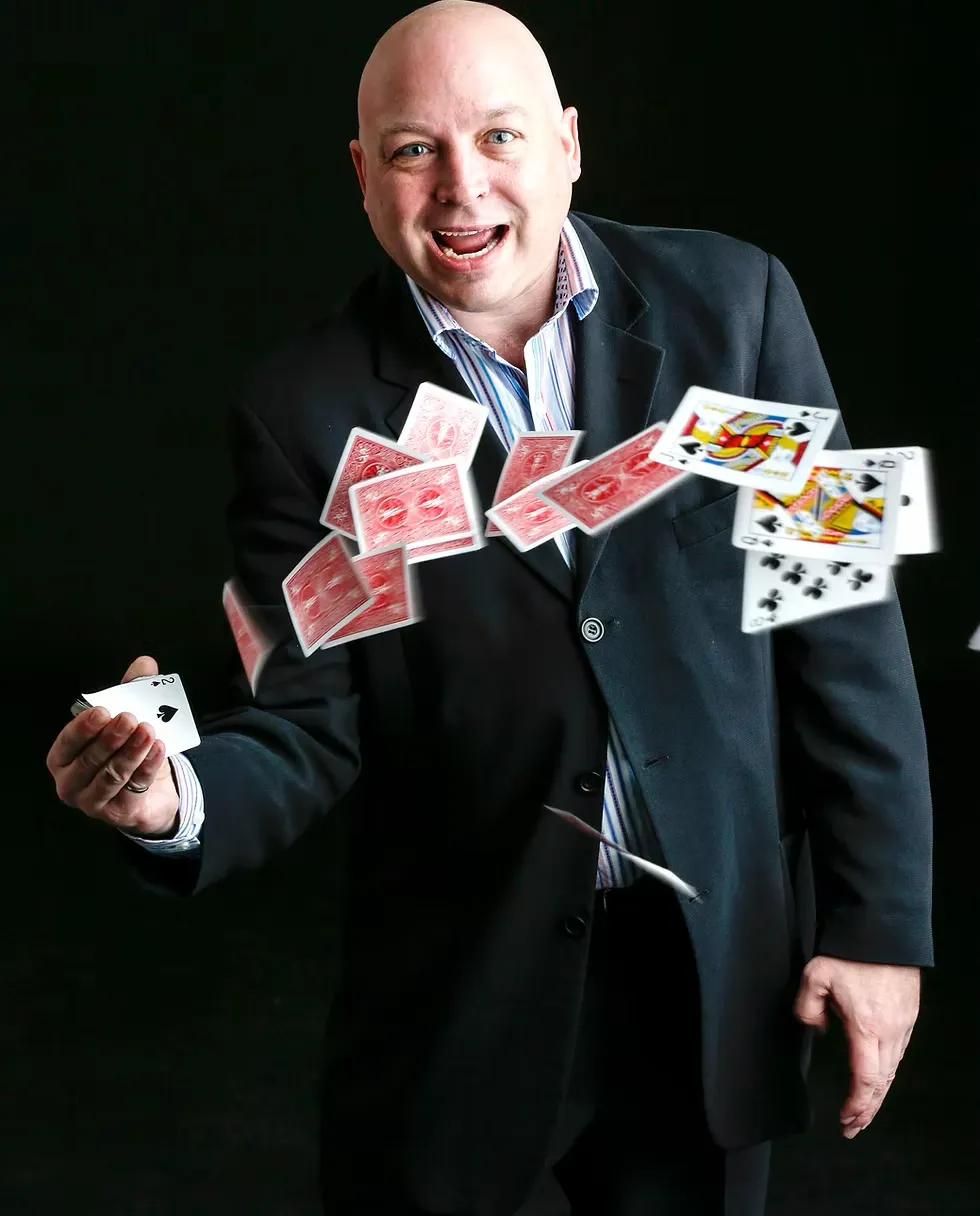 Clive the Conjuror performing sleight-of-hand at a Seattle wedding